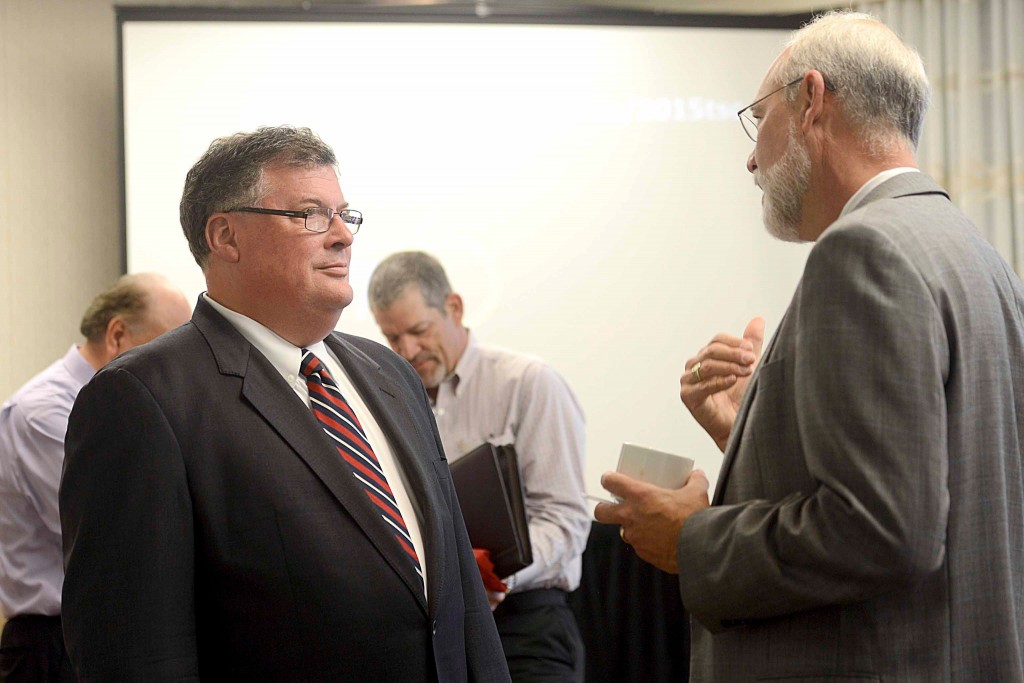 Robert Wunderlich and Texas A&M University System Vice Chancellor Tommy Williams.